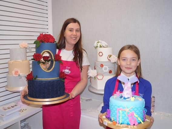Maighread Mercer and daughter Elissa won awards in a national cake competition in Birmingham