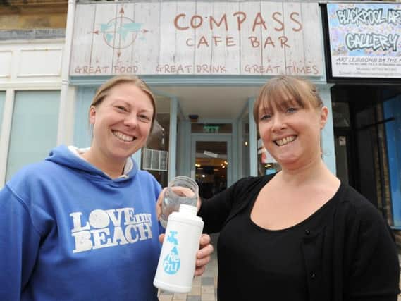 Emma Whitlock from LOVEmyBEACH with Michelle Burrows from Compass Cafe Bar, which has signed up for the Water ReFill Campaign