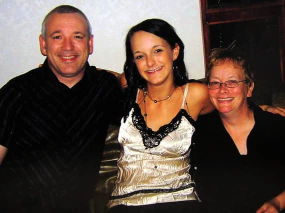 Jane Clough (centre) with parents John and Penny