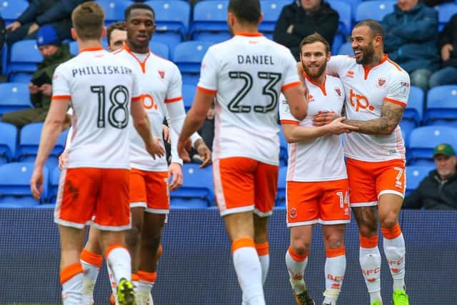 Kyle Vassell celebrates giving Blackpool a first-half lead