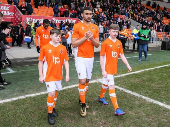 David, left and Adam Legge with Colin Daniel at Bloomfield Road