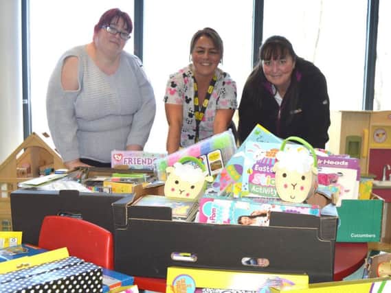 Michelle Green, Dawn Geraghty and Sue Ridley with some of the donated toys at Blackpool Victoria Hospital's childrens ward