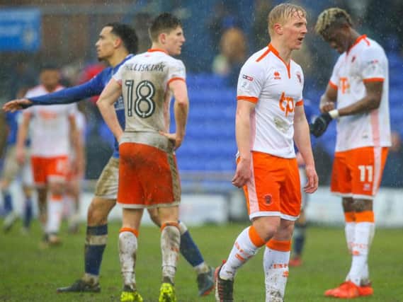 Mark Cullen shows his disappointment at full-time at Oldham
