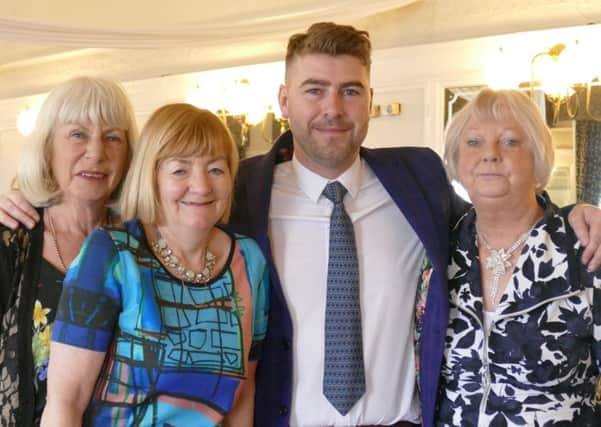 Organisers Val Southward, Jean Horner, and Pat Robinson with Cancer Research UK local fundraiser James Robinson

Organised by the Wyre group Help Beat Cancer, 80 ladies attending the fashion show and tea at the North Euston Hotel, Fleetwood, were joined by one man -  Cancer Research UKs local fundraising manager James Robinson.