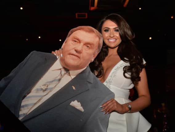 Charlotte Dawson with a cardboard cut out of her comedy legend dad Les at launch of fashion range Fredafunk in Manchester. Picture: Dave Nelson