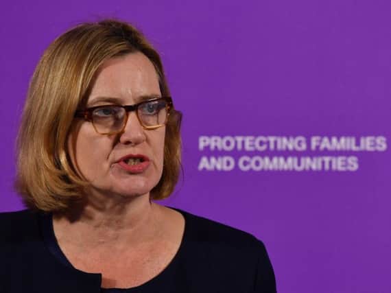 Home Secretary Amber Rudd came under fire after a major report into tackling an increase in violence made no mention of the fall in police officer numbers in recent years