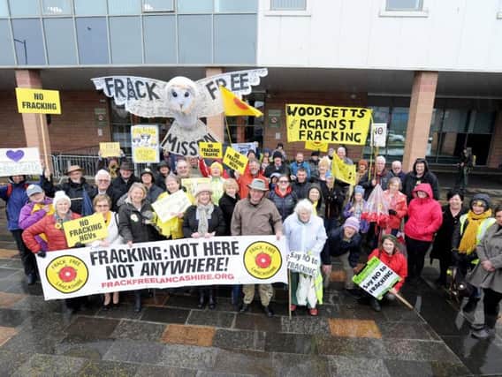 Protesters outside Blackpool Football Club on the first day of a fracking inquiry on Roseacre Wood