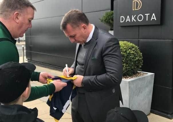 Celtic boss Brendan Rodgers also signed the shirt