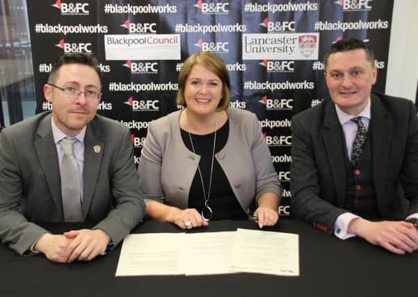 The signing of the Memorandum of Understanding with (l-r) Blackpool Council Chief Executive Neil Jack, Bev Robinson OBE and Prof Andrew Atherton from Lancaster University