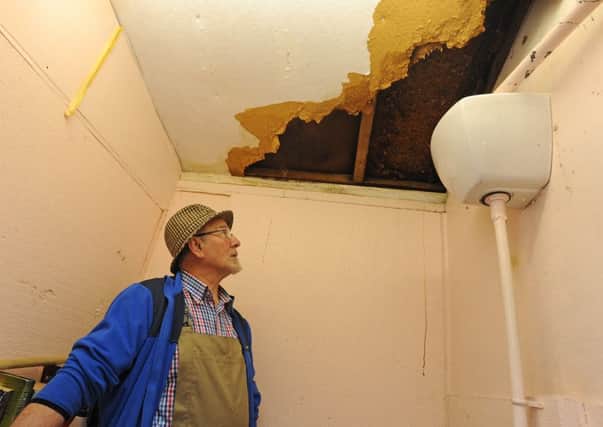 Vandals have wrecked the roof of 100-year-old bowling club in Layton.  Pictured is secretary and treasurer Derek Kay.
