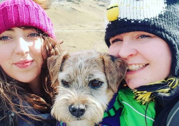 Sophie Morter and Jess Martin, with Toby the border terrier, taking part in a challenge called 10 mountains in 10 months, raising money for CALM and PAPYRUS