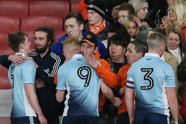 Supporters at the Emirates salute the Blackpool teams outstanding efforts in the FA Youth Cup