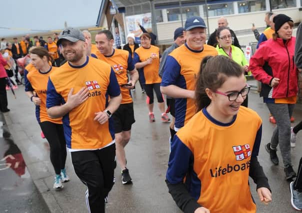The Leg It for the Lifeboats charity run took place between the Lytham and St Annes lifeboat houses.
On their way to St Annes.