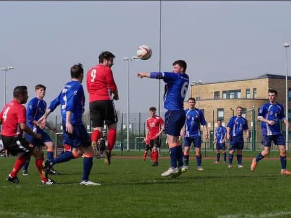 AFC Blackpool (blue) in action at Litherland
Picture: NICK GERRARD