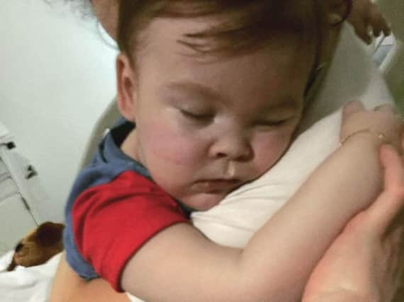 Family handout photo dated 23/04/18 supplied by the Alfies Army Official facebook page of brain-damaged boy Alfie Evans cuddling his mother Kate James at Alder Hey Hospital, Liverpool
