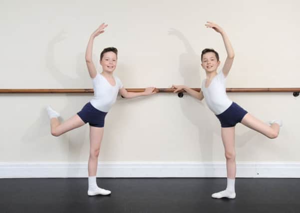 Twins Haydn Astbury (R) and Sam Astbury (L), aged 11, have both been accepted to prestigious ballet schools.