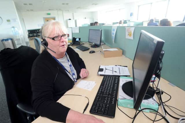 Staff at The Silver Line, a national helpline for older people.  Pictured is Sue Ashton.