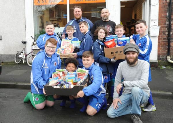 Fletwood Gym U11s have donated food to the new Mustard Seed group shop