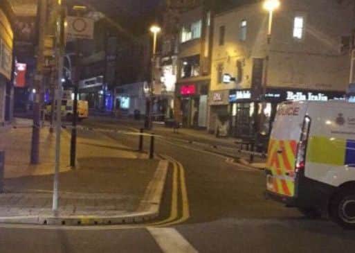 Police have hailed a member of the public after helping to talk a man down threatening to jump from a town centre building in Blackpool (Picture: Siobhan Drinkwater)