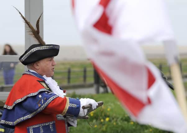 Town crier Colin Ballard  at the flag raising ceremony to launch the St George's Festival in Lytham