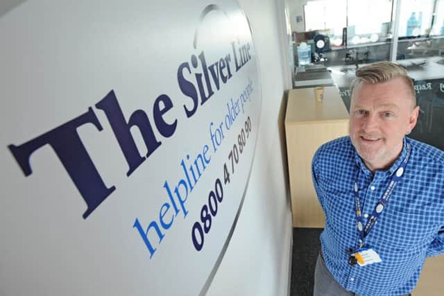 Staff at The Silver Line, a national helpline for older people.  Pictured is volunteer coordinator Kenny Dale.