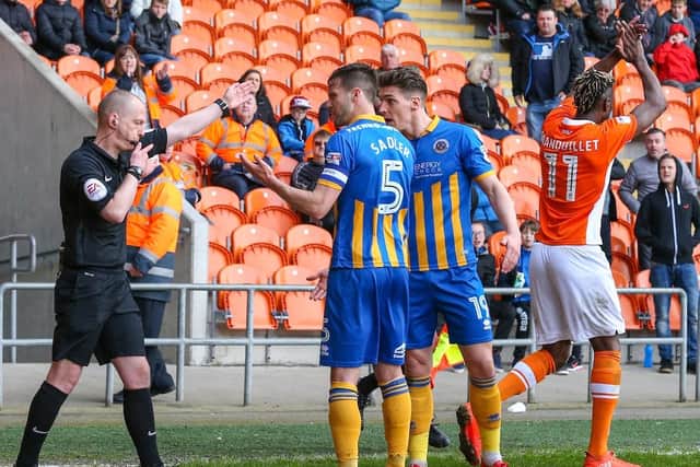 The moment referee Martin Coy overruled his linesman and awarded Blackpool's goal