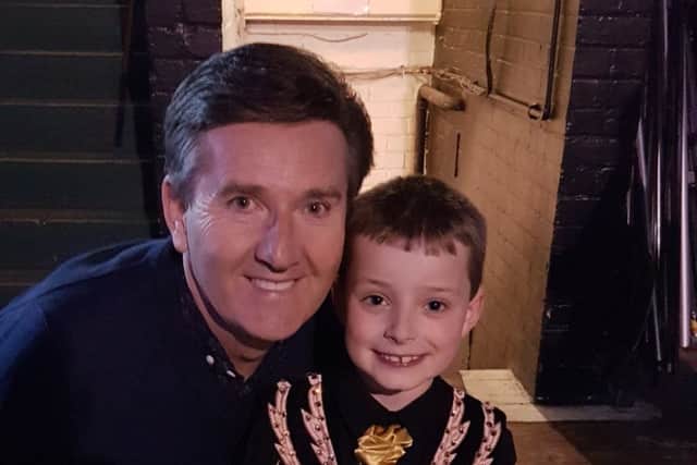 Kirian Collins, six, with singer Daniel O'Donnell