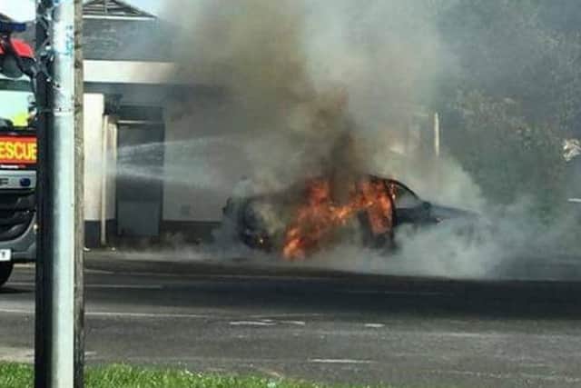 Car in flames at the Shell Garage in Fleetwood.