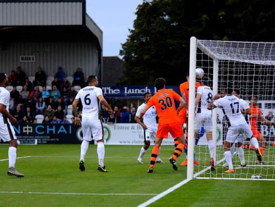 Simon Grand's headed goal gives Fylde hope at Boreham Wood