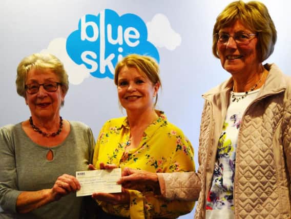 Elaine Buckley and Elizabeth Thomas gave the cheque to Kila Redfearn