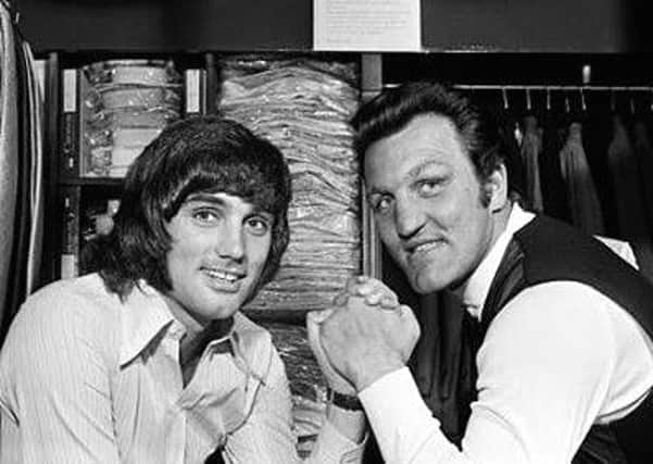 George Best with Brian London