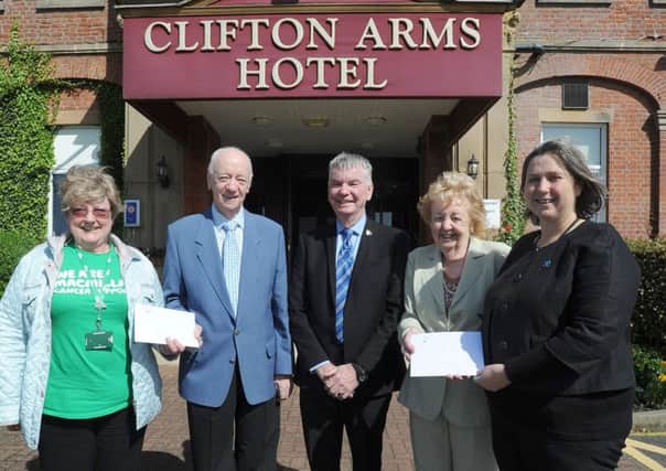 Peter and Joan Allcock celebrated their diamond wedding anniversary at the Clifton Arms Hotel and asked guests to donate money to charity.  They are pictured with Anne Loftus from Macmillan, assistant general manager Bernard Johnson from the Clifton Arms and dementia advisor for the Alzheimers Society Elaine Ravenhall.