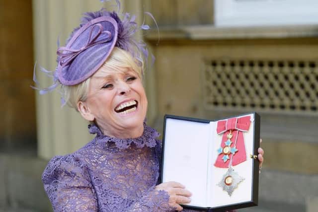 Television star Barbara Windsor after she was made a Dame Commander of the order of the British Empire by Queen Elizabeth II during an Investiture ceremony at Buckingham Palace, London