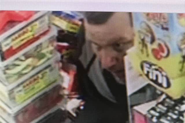 Detectives investigating a string of knife-point robberies in Blackpool have released images of a man they want to speak to.