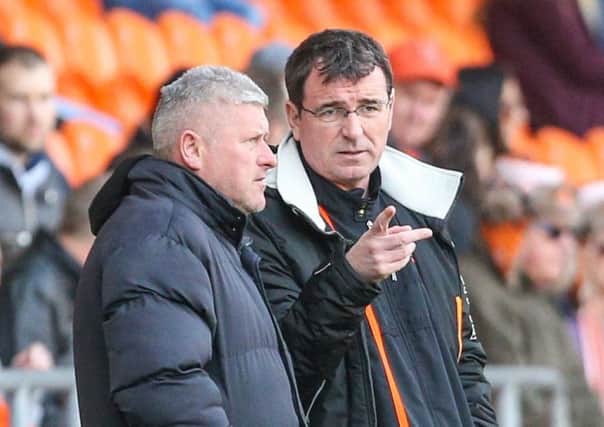 Nathan Delfouneso has high praise for the job done by Blackpool boss Gary Bowyer