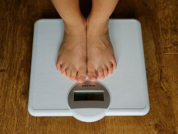 Junk food advertising could be banned on the London Underground network as part of plans to tackle the capital's "ticking time-bomb" of childhood obesity. Photo credit: Gareth Fuller/PA Wire