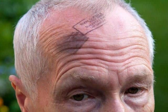 Lawrence Chard was attacked with a rubber stamp for taking pictures outside a  strip club