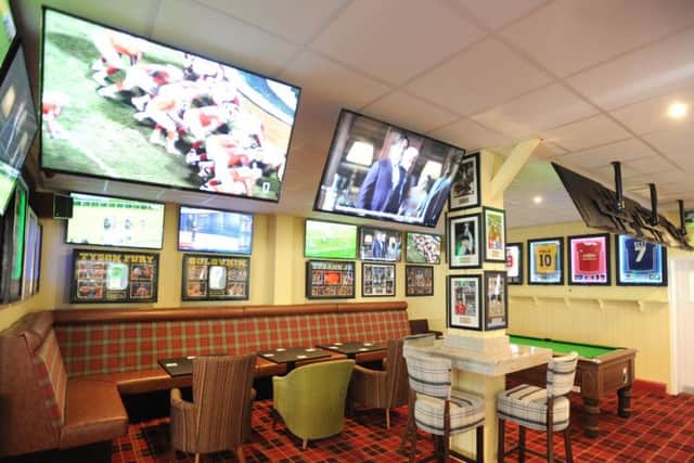 The new-look sports bar boasts 32 TV screens, snooker tables and darts boards