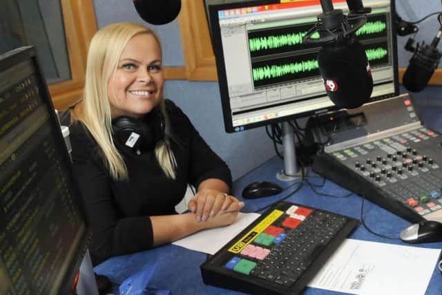 Hayley Kay at the controls for Radio Wave's breakfast show