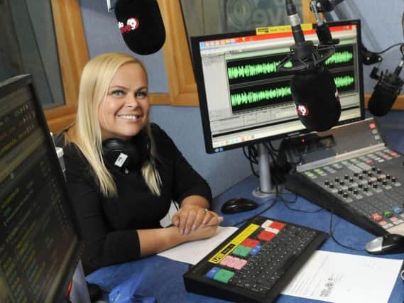 Hayley Kay at the controls for Radio Wave's breakfast show