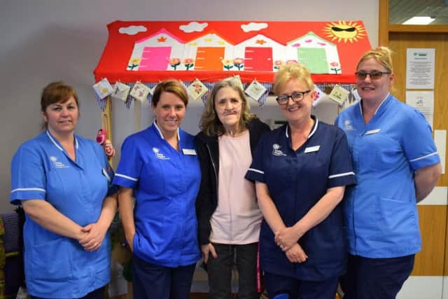 Donna with staff from the Day Therapy Unit at Trinity Hospice