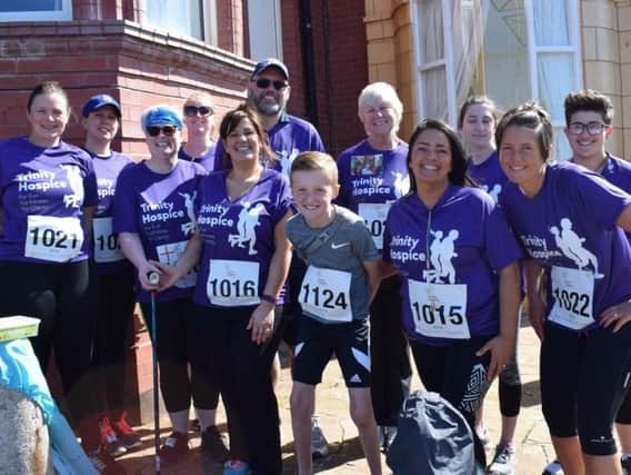 Friends and family of Clive Austin took part in the Beaverbrooks Blackpool 10km Fun Run with photographs on him pinned to their running t-shirts.