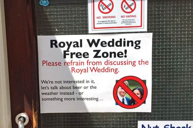 A "Royal Wedding Free Zone" poster displayed at the entrance of The Alexandra Hotel in Derby. Photo credit: Josh Payne/PA Wire