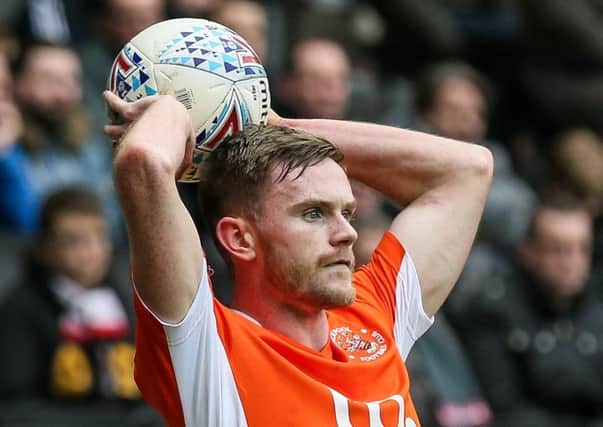 Blackpool defender Ollie Turton is taking heart from their League One campaign