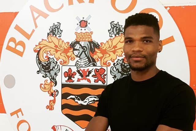 The defender is Blackpool's first signing of the summer