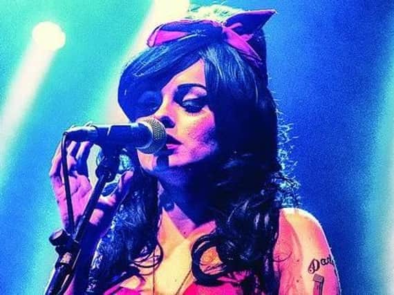 Emma Wright as Amy Winehouse tribute Lioness