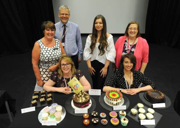 GBBO star Katie Lyon judges a baking competition at Blackpool Sixth Form college in aid of Trinity Hospice.  She is pictured with catering manager Sue Flynn, events officer Fay Stone, head of admissions Jon Mcleod, events officer Nichola Coleman and Sheila Swann from Trinity Hospice.