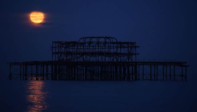 You can see the supermoon on Sunday, March 28. (Photo by Mike Hewitt/Getty Images)